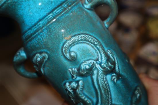 A Chinese celadon vase, a Chinese figure and two turquoise dragon vases